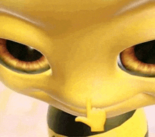 a close up of a cartoon character 's face with a finger in his mouth