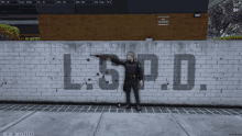 a police officer is standing in front of a brick wall with l.s.p.d. written on it