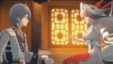 a man and a woman are standing next to each other in a room .