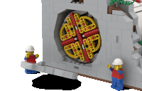 two lego figures are working on a brick wall with a circular object in the middle