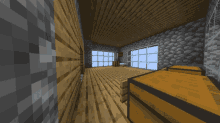 a minecraft room with a wooden floor and a few boxes