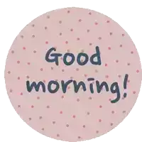 a pink circle with polka dots and the words good morning on it