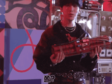 a man in a black jacket is holding a bomb that says 00 15