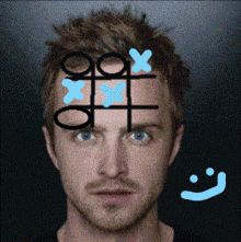 a man with tic tac toe on his forehead