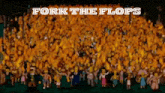 a crowd of people with the words fork the flops in white letters