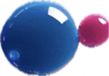 two blue and pink balls are floating in the air .