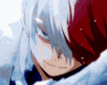 a close up of a person 's face with a red and white hair .