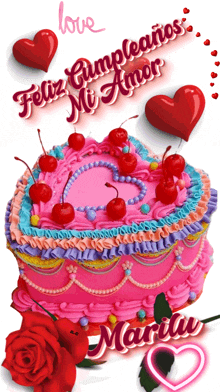 a pink heart shaped cake with cherries on it and the words love feliz cumpleanos mi amor