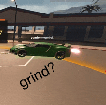 a green sports car is driving down a street with the words grind written on the ground