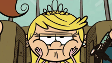 a cartoon girl with a tiara on her head is making a funny face