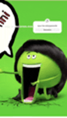 a green cartoon character with a speech bubble on a green background is talking .