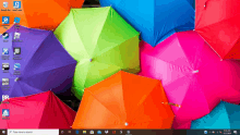 a computer screen with a bunch of colorful umbrellas and a search bar