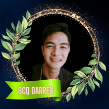 a picture of a man with the name scq darren on a green ribbon