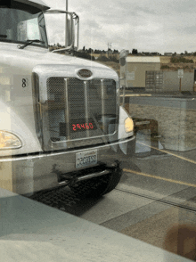 a peterbilt truck with a license plate that says 32c3t50