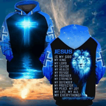 a blue and black hoodie that says jesus is my god my king