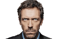 a man with a beard and blue eyes is making a serious face .
