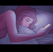 a woman is laying in bed looking at her phone at night .