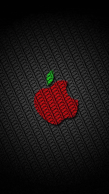 a red apple with a green leaf is on a black background