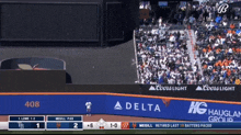 a baseball game is being played with ads for coors light and delta in the outfield