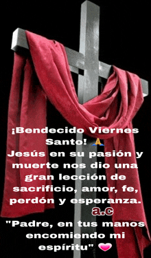 a cross with a red scarf around it and a quote in spanish