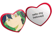 a heart shaped mirror with a picture of a boy and the words " seto my beloved "