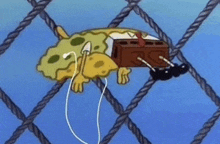 a cartoon of spongebob hanging on a rope with headphones