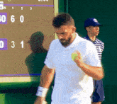 a man in a white shirt is holding a tennis ball in front of a scoreboard that says 30 6 0