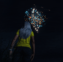 a woman in a yellow shirt stands in front of a firework display