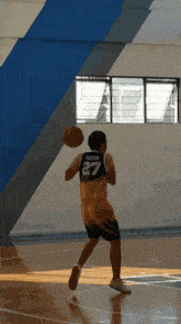 a basketball player wearing a jersey with the number 27