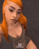 a woman with red hair is taking a selfie in a very plunging neckline .