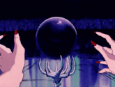 a woman with long red nails is holding a purple ball