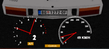 a speedometer with a license plate that says bg 1273-of