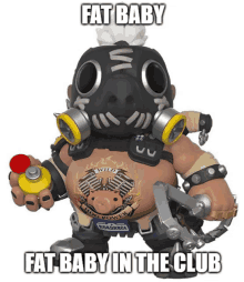 a figurine of a pig with the words fat baby fat baby in the club below it