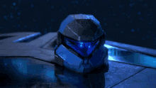 a blue helmet with the letter l on the front of it