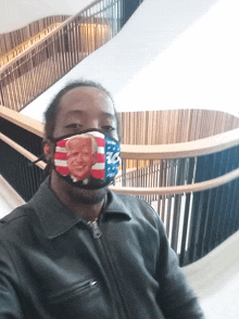 a man wearing a mask that says biden on it