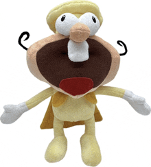 a stuffed animal with a yellow cape and white arms and legs