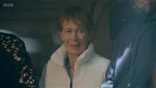 a woman in a white vest says " i just farted " in front of a bbc logo