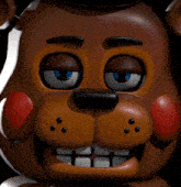 a close up of a teddy bear with his tongue out