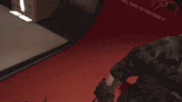 a man is laying on the floor with blood on the ground
