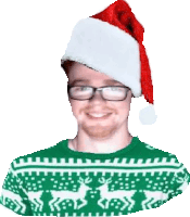 a man wearing a santa hat and glasses is smiling and wearing a green sweater .