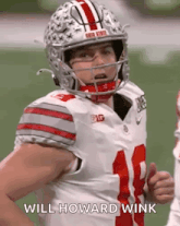 a football player wearing a helmet is giving a thumbs up and says will howard wink