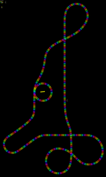 a computer screen shows a roller coaster track with rainbow lights