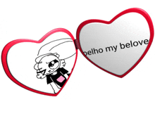 a heart shaped mirror says " belho my belove " on it