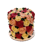 a cake decorated with roses and the word abc