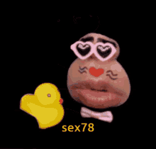 a picture of a person with a rubber duck in their mouth with the words sex78 below it