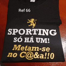 a black t-shirt that says sporting so ha um