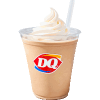 a milkshake with whipped cream and a straw from dq