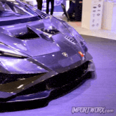 a picture of a car with the website importwork.com on the bottom right