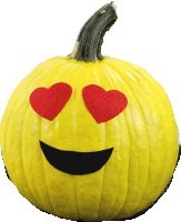 a yellow pumpkin with a smiley face and red hearts in its eyes