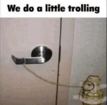 a picture of a door with a bomb attached to it and the caption " we do a little trolling "